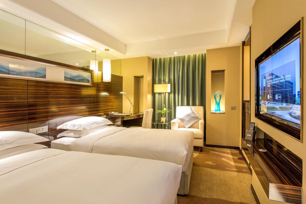 Hotel Longda Changchun Zimmer foto