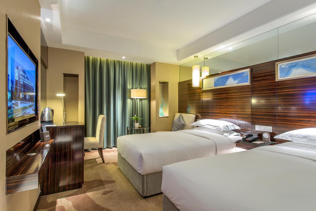 Hotel Longda Changchun Zimmer foto